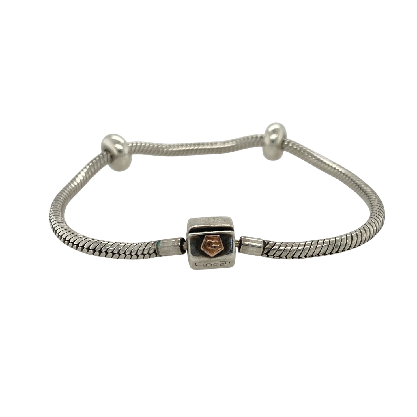 This pre-owned Clogau charm bracelet is a beautiful sterling silver and 9ct rose gold design, complete with two stoppers ready for adding your favourite charms.

Design: Featuring a classic Clogau charm bracelet design, this piece combines polished sterling silver with signature 9ct rose gold detailing for a timeless two-tone finish.
