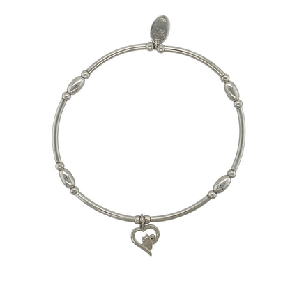 This pre-owned Clogau Affinity Pawprint Heart bracelet is a charming sterling silver design, combining a comfortable stretchy style with a meaningful pawprint and heart motif.

Design: Featuring the Clogau Affinity design with a pawprint heart detail, this bracelet offers a meaningful way to celebrate a much-loved pet. The stretchy design makes it easy to wear, while the polished silver finish gives it a simple and versatile look for everyday styling.
Material: Made from 925 sterling silver.