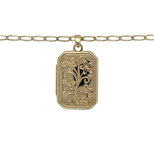 This pre-owned 9ct yellow gold flower patterned rectangle locket necklace is a classic design, combining delicate floral detailing with a timeless locket style.

Design: Featuring a rectangular locket decorated with an elegant flower pattern, this necklace offers a traditional design with decorative detail. The locket measures approximately 2.6cm long including the bail and is suspended from a 20-inch open curb chain.
Material: Made from 9-carat yellow gold.