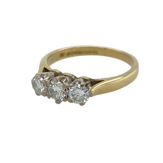This pre-owned 18ct yellow gold diamond trilogy ring is a timeless design, featuring three brilliant cut diamonds with approximately 0.50ct of diamond content in total.

Design: Featuring three brilliant cut diamonds set across the front, this classic trilogy ring offers a traditional and elegant look, with the warm 18ct yellow gold complementing the diamonds beautifully.
Material: Made from 18-carat yellow gold.