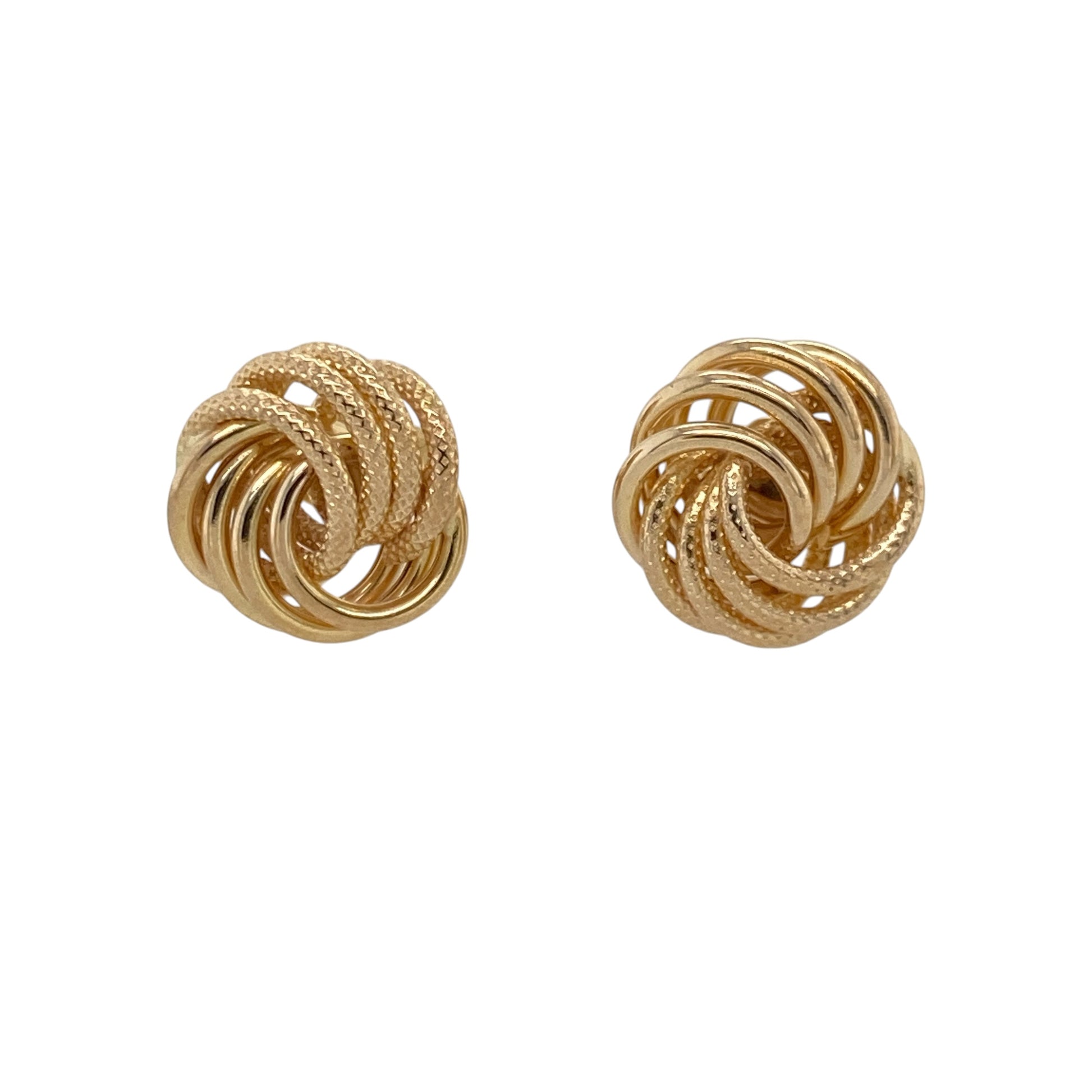 These pre-owned 9ct yellow gold textured knot stud earrings are a classic design, combining an intertwined knot shape with decorative textured detailing.

Design: Featuring a traditional knot design with a textured finish, these stud earrings offer a timeless yellow gold look with added detail and character. Measuring approximately 11mm, they are a versatile size for both everyday wear and special occasions.
Material: Made from 9-carat yellow gold.