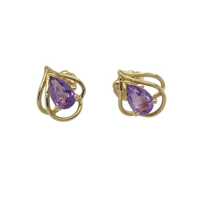 These pre-owned 9ct yellow gold amethyst teardrop stud earrings are a colourful and elegant design, featuring rich purple gemstones in a classic teardrop shape.

Design: Featuring a teardrop-shaped amethyst in each earring, these studs combine rich purple tones with warm yellow gold for a timeless gemstone look. Their simple design makes them a versatile choice for both everyday wear and special occasions.
Material: Made from 9-carat yellow gold.