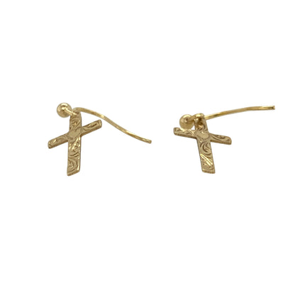 These pre-owned 9ct yellow gold patterned cross drop earrings are a traditional design, featuring decorative detailing across the cross-shaped drops.

Design: Featuring a cross-shaped drop with patterned detailing, these earrings combine a traditional symbol with a warm yellow gold finish. Their lightweight drop design makes them a distinctive piece suitable for everyday wear or special occasions.
Material: Made from 9-carat yellow gold.
Earring Detail: Patterned cross drop design.
