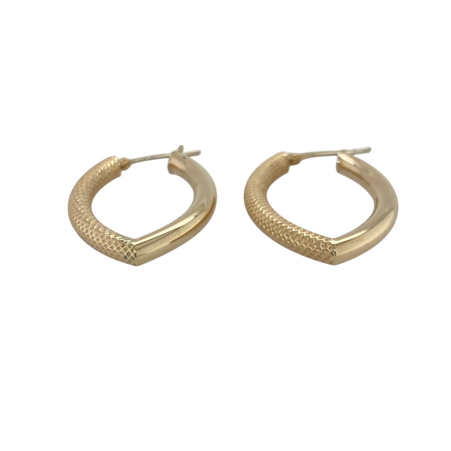 These pre-owned 9ct yellow gold marquise-shaped creole earrings are a distinctive design, combining a polished finish with textured detailing on one side.

Design: Featuring an elegant marquise-shaped creole design, these earrings have textured detailing on one side contrasted with a plain polished finish for added interest. Their unusual shape gives the classic gold creole a distinctive twist while remaining versatile for everyday wear.
Material: Made from 9-carat yellow gold.