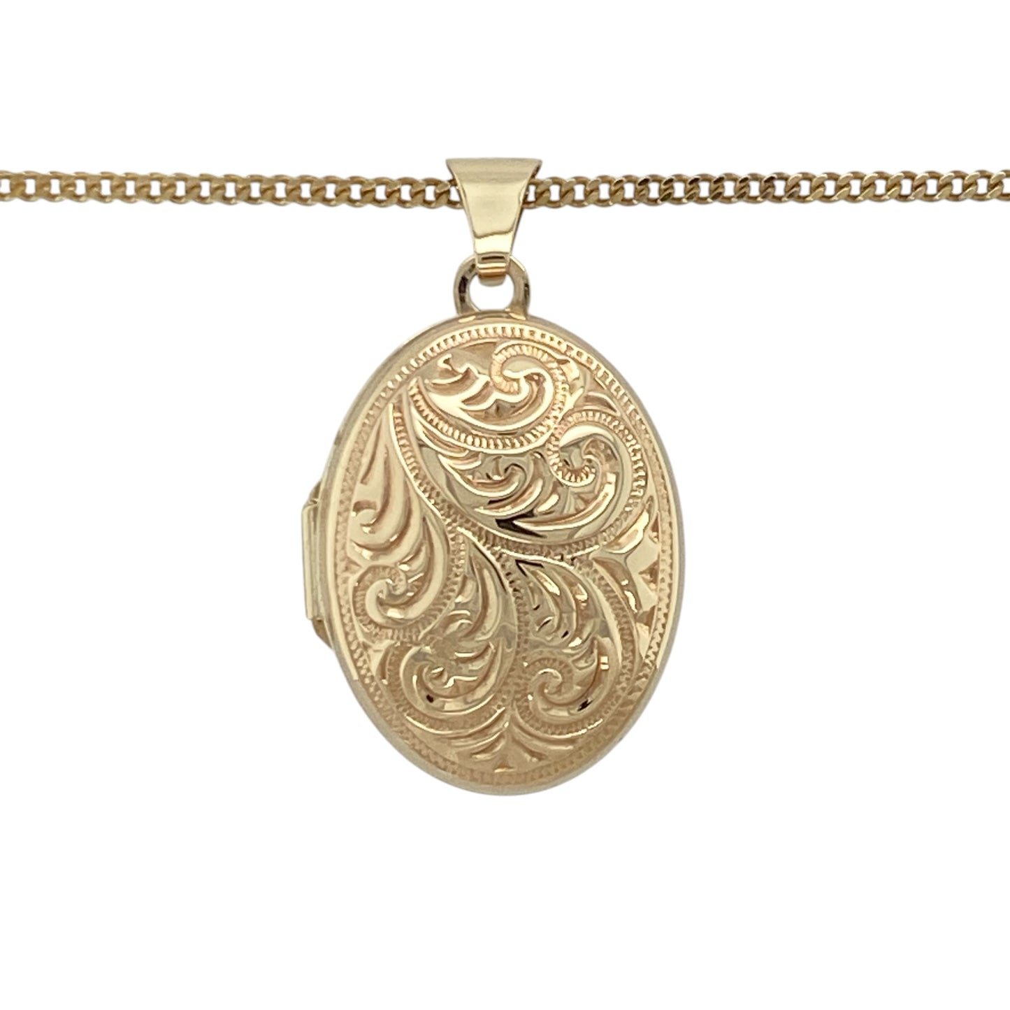 This pre-owned 9ct yellow gold patterned oval locket necklace is a classic design, combining decorative detailing with a traditional keepsake style.

Design: Featuring an oval locket with patterned detailing, this necklace offers a timeless design that can hold a meaningful photograph or keepsake inside. The locket measures approximately 2.8cm long including the bail and is suspended from an 18-inch curb chain.
Material: Made from 9-carat yellow gold.