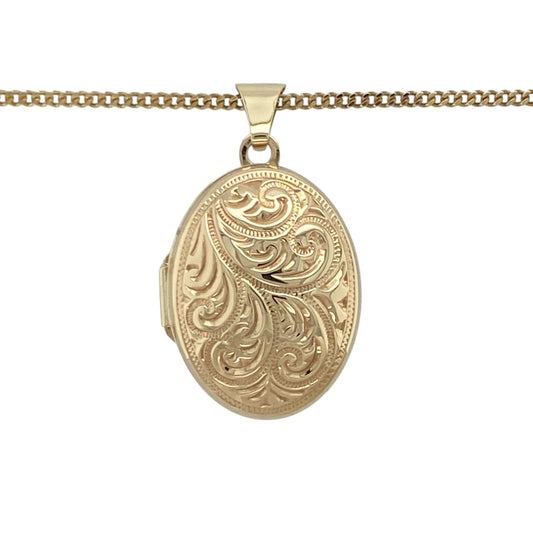 This pre-owned 9ct yellow gold patterned oval locket necklace is a classic design, combining decorative detailing with a traditional keepsake style.

Design: Featuring an oval locket with patterned detailing, this necklace offers a timeless design that can hold a meaningful photograph or keepsake inside. The locket measures approximately 2.8cm long including the bail and is suspended from an 18-inch curb chain.
Material: Made from 9-carat yellow gold.