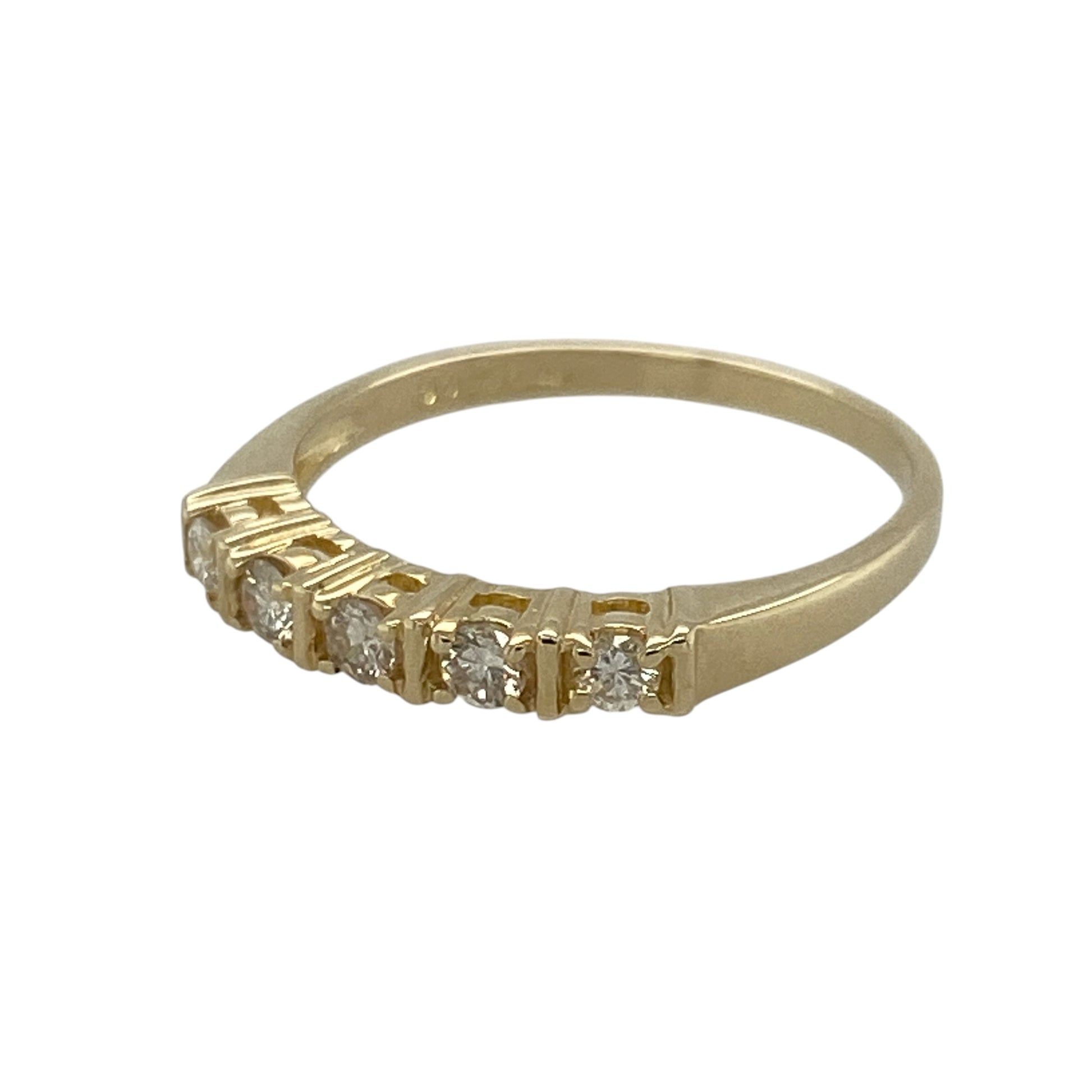 This pre-owned 9ct yellow gold diamond band ring is a classic design, featuring five brilliant cut diamonds with approximately 0.30ct of diamond content in total.

Design: Featuring five brilliant cut diamonds set across the front of a slim yellow gold band, this ring offers a timeless and versatile diamond design.
Material: Made from 9-carat yellow gold.
Gemstone Detail: Five brilliant cut diamonds with approximately 0.30ct of diamond content set in total.