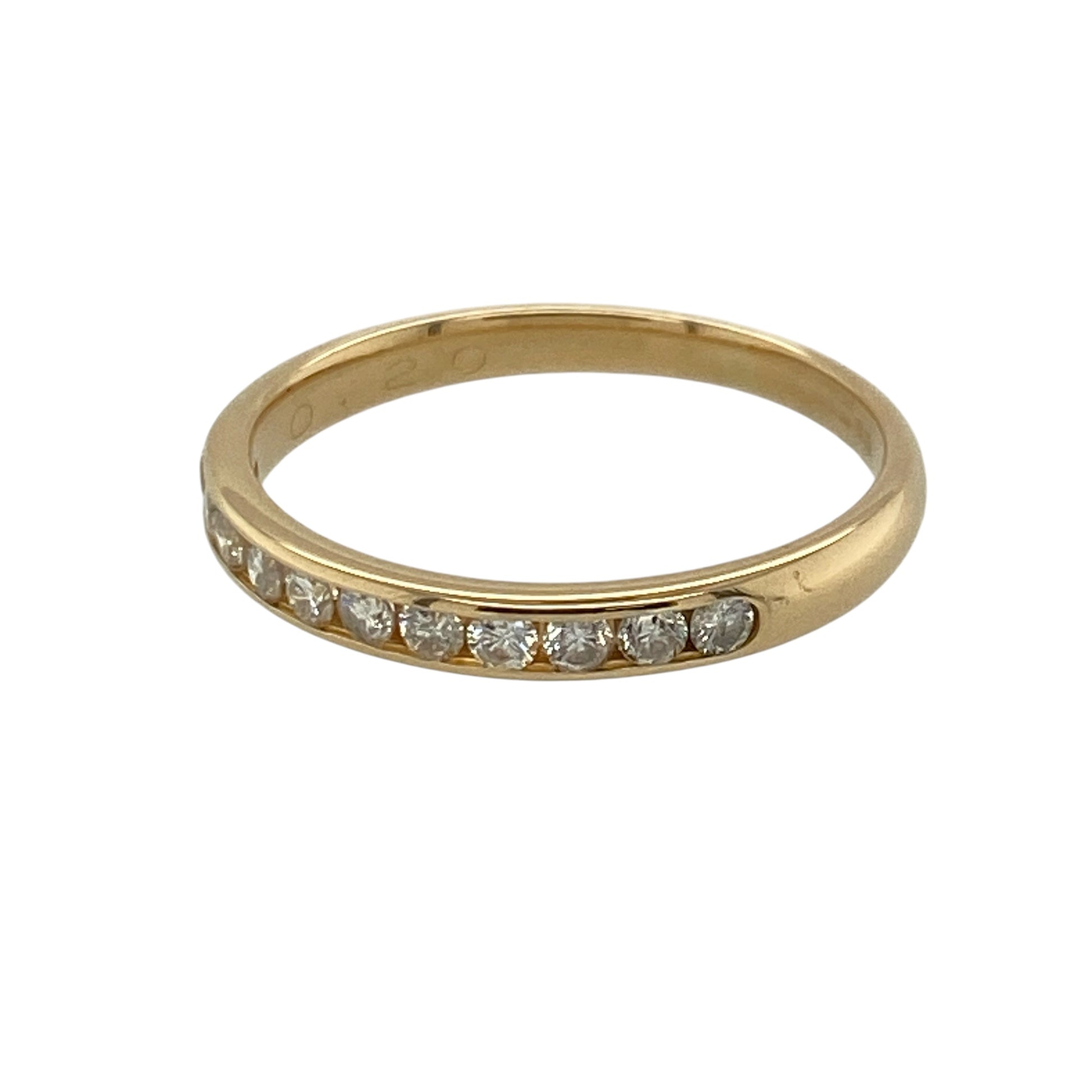 This pre-owned 18ct yellow gold diamond band ring is a classic and delicate design, featuring approximately 0.20ct of diamond content across the front.

Design: Featuring diamonds set across a slim yellow gold band, this ring offers a timeless design that can be worn alone or paired with other rings.
Material: Made from 18-carat yellow gold.
Gemstone Detail: Approximately 0.20ct of diamond content set in total.
Ring Detail: Diamond set band measuring approximately 2mm wide at the front.