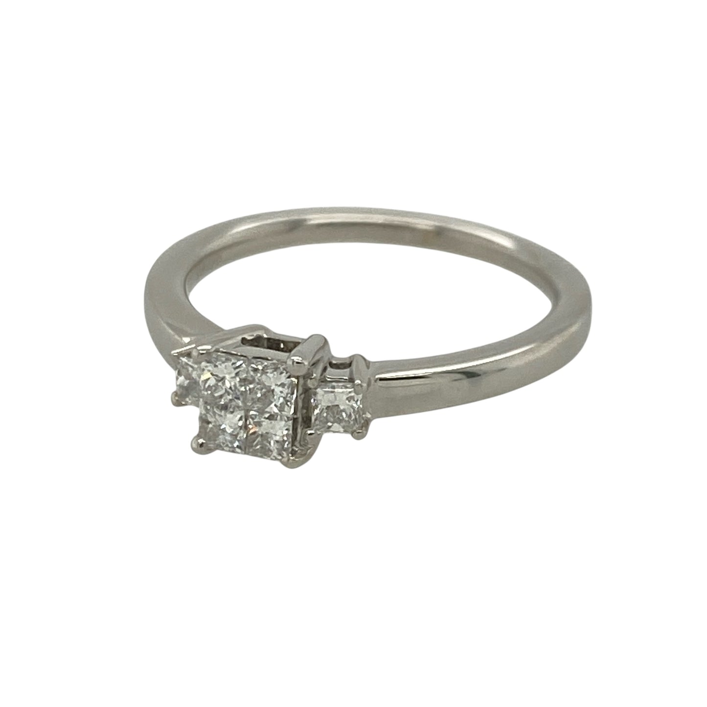 This pre-owned 9ct white gold diamond illusion trilogy ring is a distinctive design, featuring interlocking princess cut diamonds with approximately 0.36ct of diamond content in total.

Design: Featuring four interlocking princess cut diamonds arranged to create the appearance of a larger centre stone, with an additional diamond set on either side to form an illusion trilogy design. The white gold setting complements the geometric diamond arrangement for an eye-catching finish.