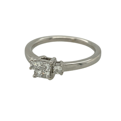 This pre-owned 9ct white gold diamond illusion trilogy ring is a distinctive design, featuring interlocking princess cut diamonds with approximately 0.36ct of diamond content in total.

Design: Featuring four interlocking princess cut diamonds arranged to create the appearance of a larger centre stone, with an additional diamond set on either side to form an illusion trilogy design. The white gold setting complements the geometric diamond arrangement for an eye-catching finish.