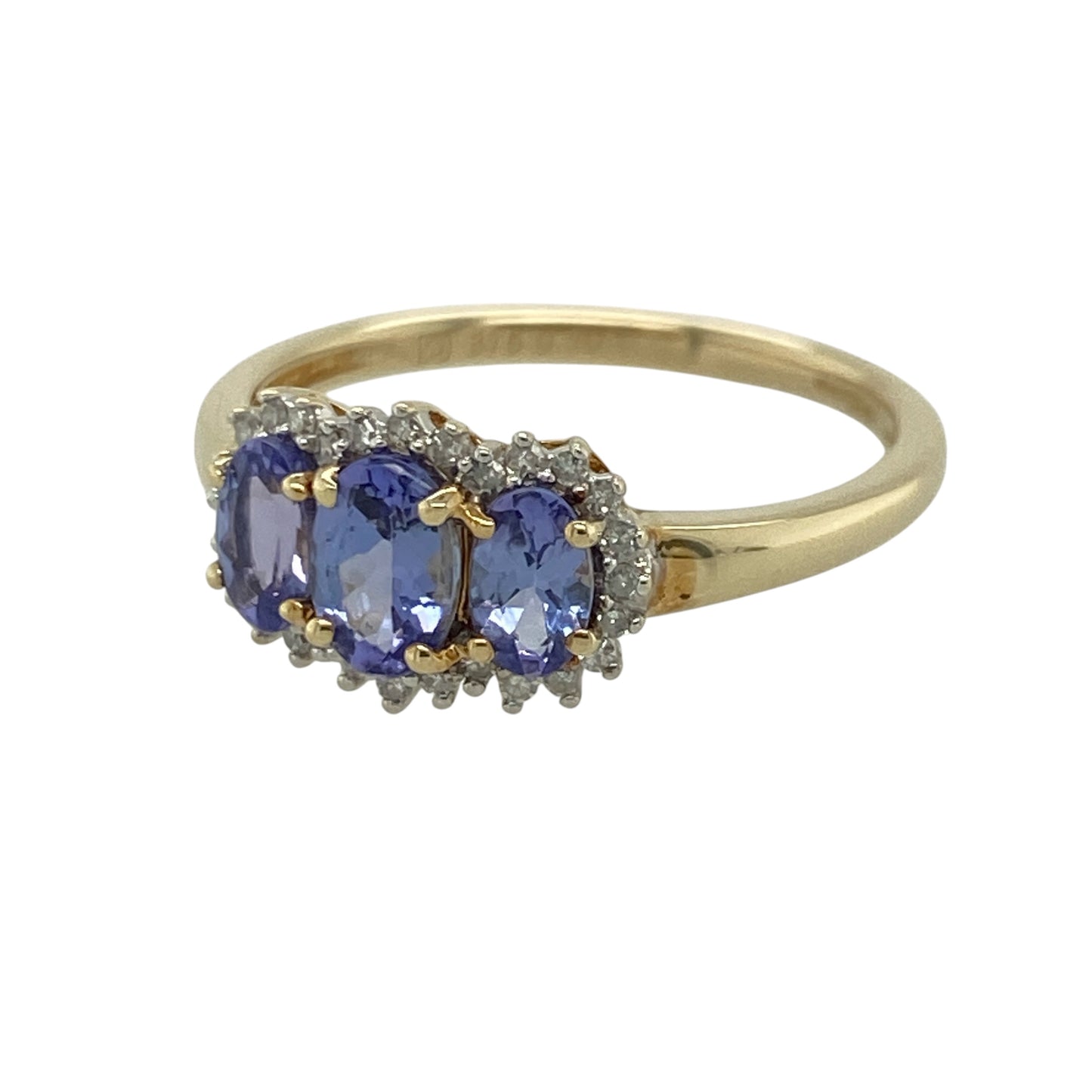This pre-owned 9ct yellow gold diamond and tanzanite trilogy cluster ring is a colourful three stone design, featuring three oval tanzanites individually surrounded by diamonds.

Design: Featuring three oval tanzanites arranged in a trilogy design, each stone is surrounded by diamonds to create three individual clusters across the front of the ring. The rich tones of the tanzanite contrast beautifully against the warm yellow gold.
Material: Made from 9-carat yellow gold.