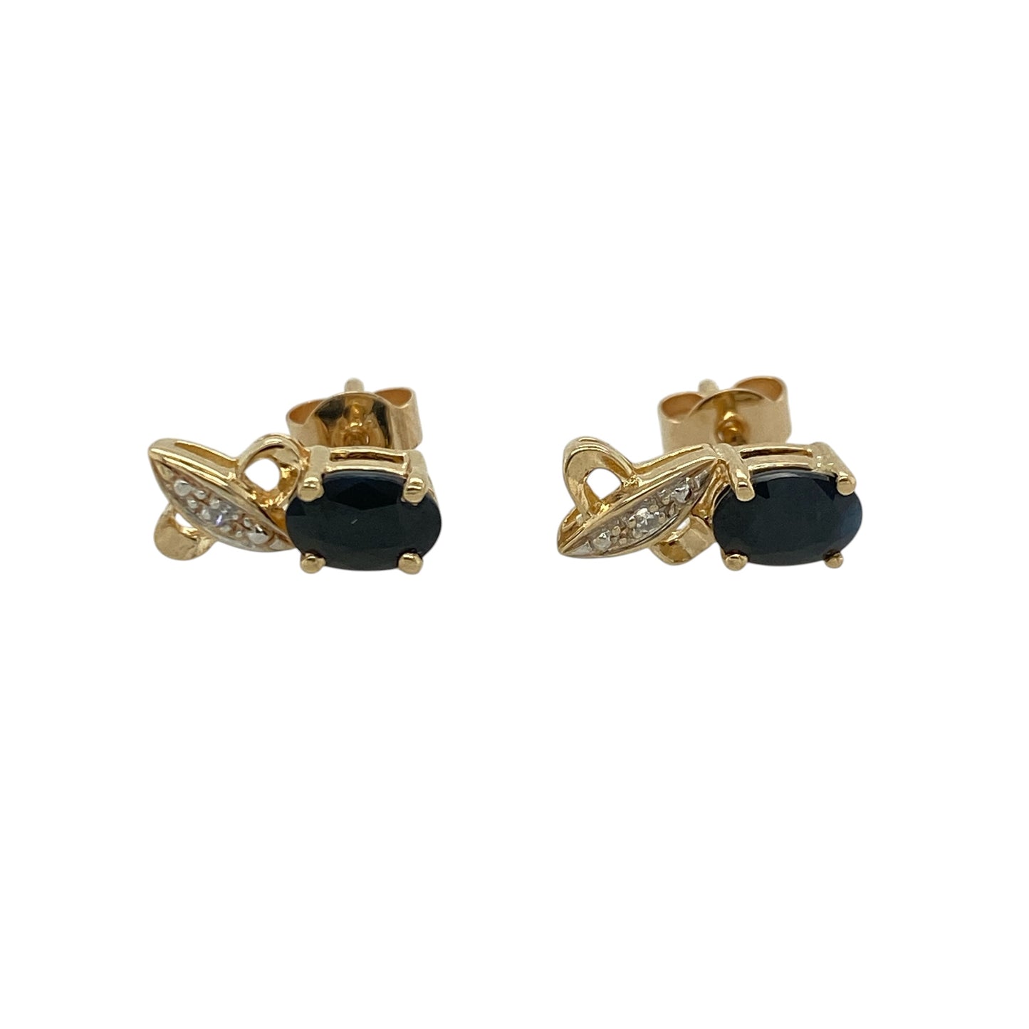 These pre-owned 9ct yellow gold diamond and sapphire stud earrings are a classic gemstone design, featuring oval sapphires accented with diamond detailing.

Design: Featuring an oval sapphire in each stud with diamond detailing, these earrings combine rich blue tones with warm 9ct yellow gold for a timeless look.
Material: Made from 9-carat yellow gold.
Gemstone Detail: Each earring features an oval sapphire measuring approximately 6mm by 4mm, accented with diamonds.