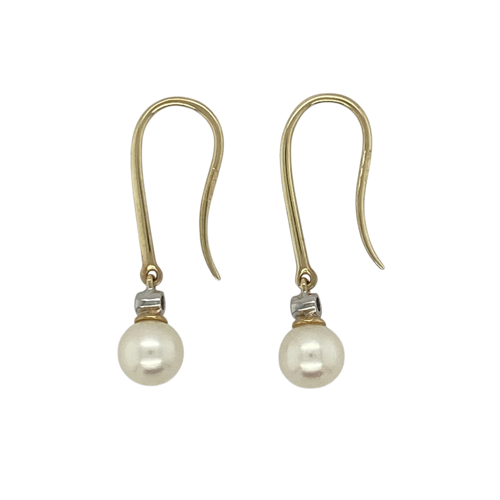 These pre-owned 9ct yellow gold diamond and pearl drop earrings are a classic design, combining round pearls with delicate diamond detailing.

Design: Featuring a pearl drop on each earring accented with diamonds, these earrings combine the soft lustre of pearl with warm 9ct yellow gold for a timeless look.
Material: Made from 9-carat yellow gold.
Gemstone Detail: Each earring features a pearl measuring approximately 6mm in diameter with diamond detailing.