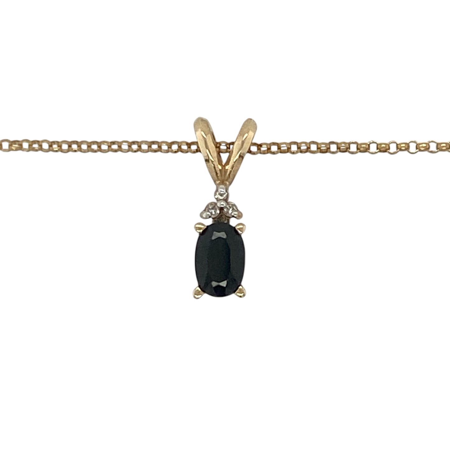 This pre-owned 9ct yellow gold diamond and sapphire pendant necklace is a classic gemstone design, featuring an oval sapphire accented with diamond detailing.

Design: Featuring an oval sapphire with diamond detailing, this pendant combines rich blue tones with warm 9ct yellow gold and is suspended from a 16-inch belcher chain.
Material: Made from 9-carat yellow gold.
Gemstone Detail: Oval sapphire measuring approximately 6mm by 4mm, accented with diamonds.