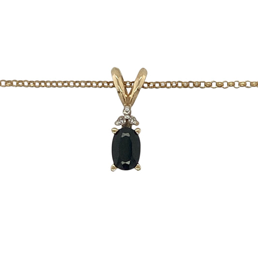 This pre-owned 9ct yellow gold diamond and sapphire pendant necklace is a classic gemstone design, featuring an oval sapphire accented with diamond detailing.

Design: Featuring an oval sapphire with diamond detailing, this pendant combines rich blue tones with warm 9ct yellow gold and is suspended from a 16-inch belcher chain.
Material: Made from 9-carat yellow gold.
Gemstone Detail: Oval sapphire measuring approximately 6mm by 4mm, accented with diamonds.