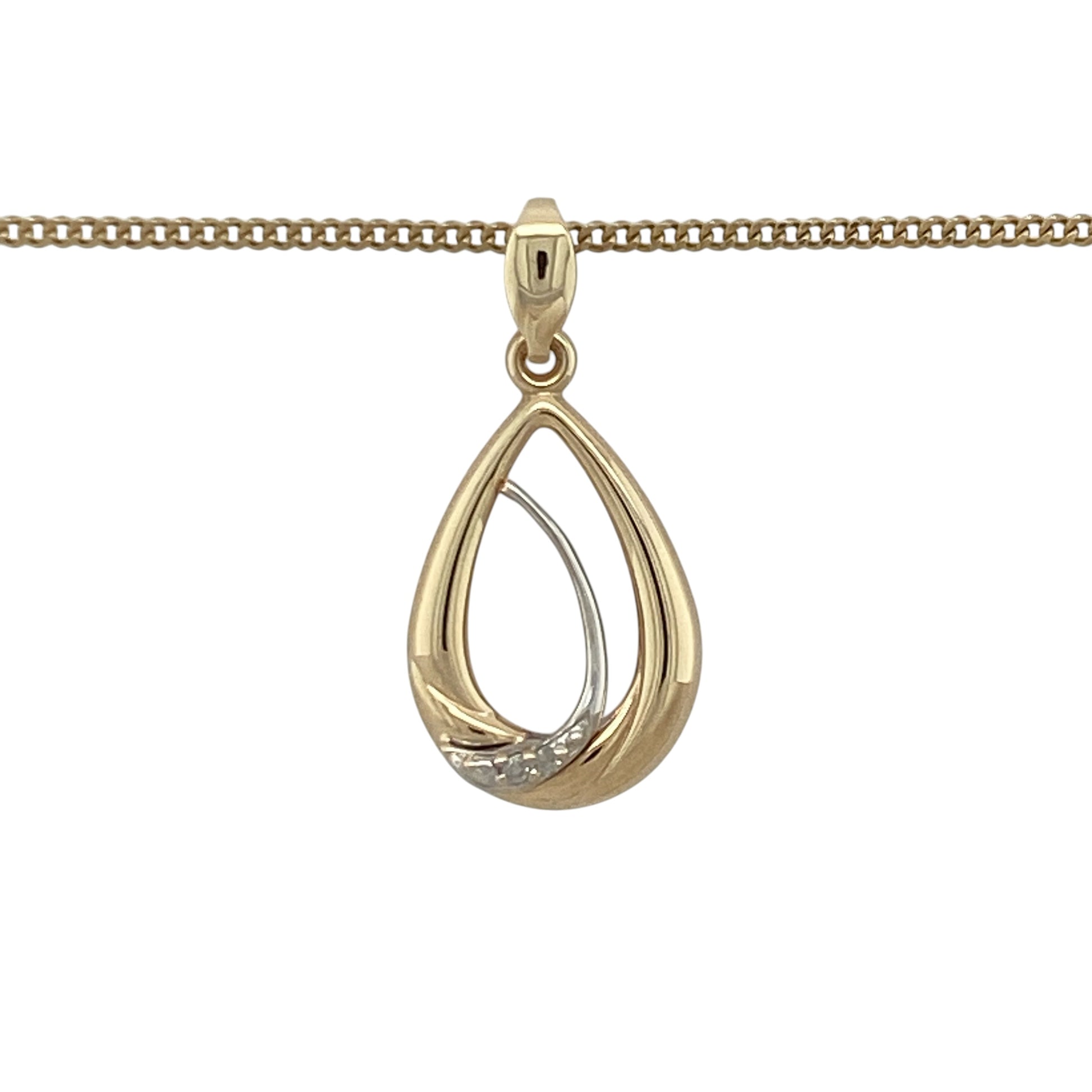 This pre-owned 9ct yellow and white gold diamond teardrop pendant necklace is an elegant two-tone design, featuring diamond detailing within a classic teardrop shape.

Design: Featuring a teardrop-shaped pendant with diamond detailing, this necklace combines yellow and white gold for a contrasting two-tone finish. The pendant measures approximately 2.4cm long including the bail and is suspended from a 20-inch curb chain.
Material: Made from 9-carat yellow and white gold.
Gemstone Detail: Set with diamonds.