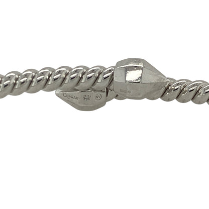 This pre-owned Clogau twisted wrap around bangle is a substantial two-tone design, combining 925 silver with signature 9ct rose gold detailing.

Design: Featuring a twisted wrap around design, this Clogau bangle combines silver with contrasting rose gold detailing for a distinctive two-tone finish.
Material: Made from 925 silver with 9-carat rose gold detailing.
Bangle Detail: Twisted wrap around design measuring approximately 4mm wide with a diameter of approximately 7cm.