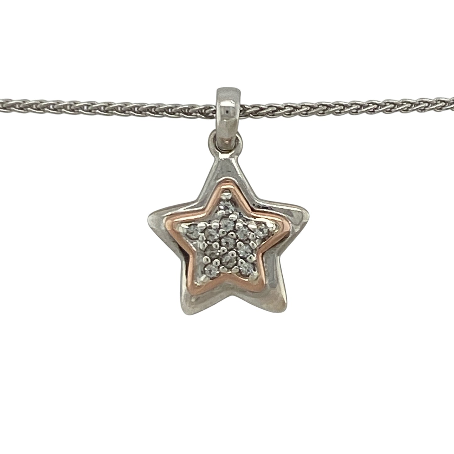 This pre-owned Clogau star pendant necklace is a delicate two-tone design, combining 925 silver with 9ct rose gold and white topaz detailing.

Design: Featuring a star-shaped pendant with contrasting rose gold and white topaz detailing, this Clogau piece is suspended from a 16-inch wheat chain for a classic finish.
Material: Made from 925 silver with 9-carat rose gold detailing.
Gemstone Detail: Set with white topaz.
Pendant Detail: Star pendant measuring approximately 2.1cm long including the bail.