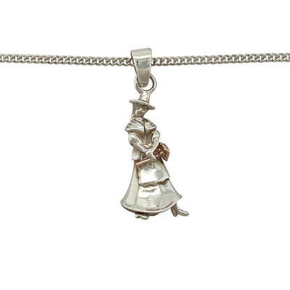 This pre-owned Clogau Welsh Lady pendant necklace is a distinctive Welsh-inspired design, combining 925 silver with signature 9ct rose gold detailing.

Design: Featuring a traditional Welsh Lady design, this Clogau pendant combines silver with contrasting rose gold detailing and is suspended from an 18-inch Clogau curb chain.
Material: Made from 925 silver with 9-carat rose gold detailing.
Pendant Detail: Welsh Lady pendant measuring approximately 2.8cm long including the bail.