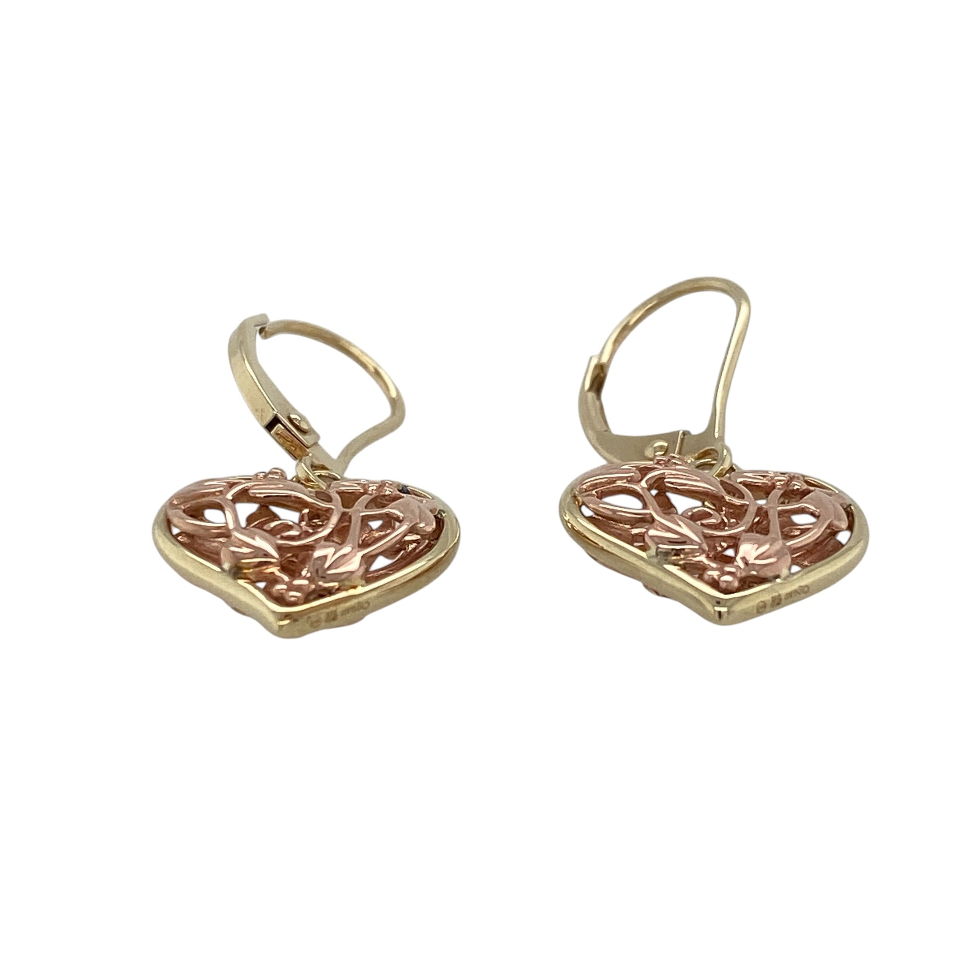 These pre-owned Clogau Tree of Life Fairy drop earrings are a distinctive two-tone design, combining 9ct yellow and rose gold with a heart-shaped finish.

Design: Featuring a fairy within a heart-shaped drop with Tree of Life inspired detailing, these Clogau earrings combine yellow and rose gold for a contrasting two-tone design.
Material: Made from 9-carat yellow and rose gold.
Earring Detail: Heart-shaped drop earrings featuring a Tree of Life Fairy design.
Size & Weight: Total weight 2.50 grams.