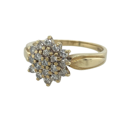 This pre-owned 9ct yellow gold diamond cluster ring is a statement design, featuring approximately 0.50ct of diamond content set across the cluster.

Design: Featuring a classic diamond cluster design, this ring has a substantial 12mm front finished in warm 9ct yellow gold.
Material: Made from 9-carat yellow gold.
Gemstone Detail: Approximately 0.50ct of diamond content set in total.
Ring Detail: Front of the ring measures approximately 12mm high.
Size & Weight: Ring size P. Total weight 2.90 grams.