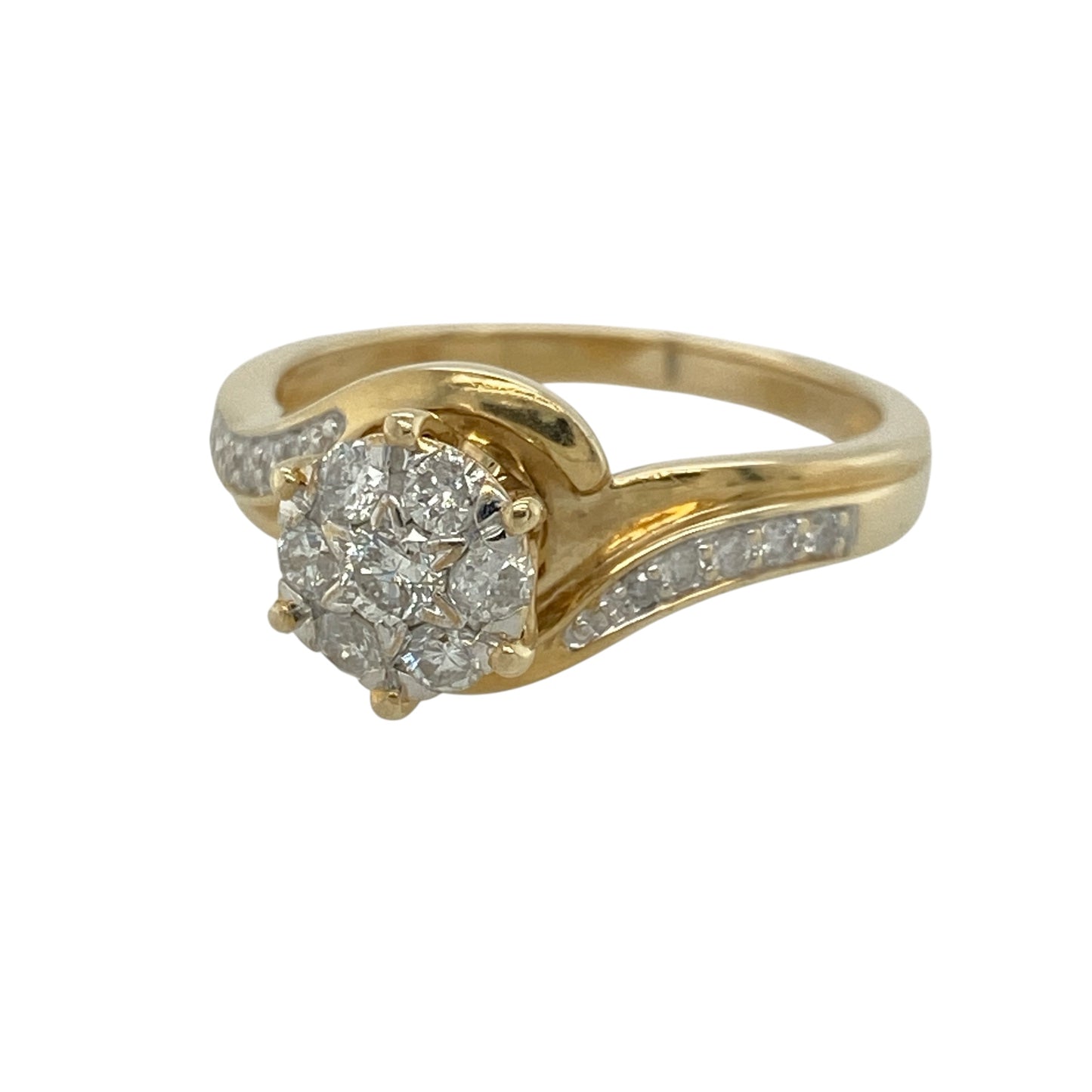 This pre-owned 9ct yellow gold diamond illusion set solitaire cluster ring is a striking design, using multiple diamonds to create the appearance of a larger solitaire centre.

Design: Featuring an illusion set solitaire-style cluster, this ring brings multiple diamonds together to create a larger central appearance, finished in warm 9ct yellow gold.
Material: Made from 9-carat yellow gold.
Gemstone Detail: Approximately 0.50ct of diamond content set in total.
