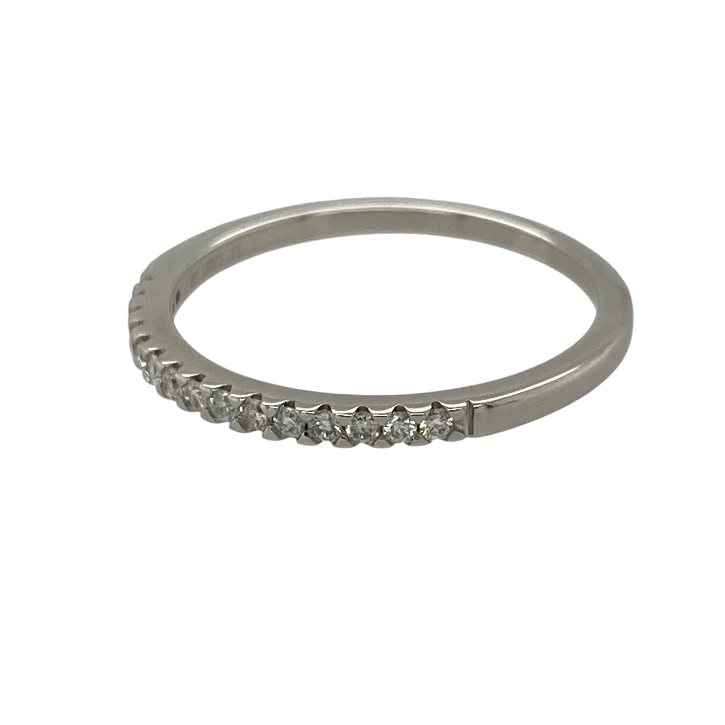 This pre-owned 18ct white gold diamond band ring is a delicate design, featuring approximately 0.15ct of diamond content set across the front.

Design: Featuring a slim diamond set band design, this ring has a simple profile finished in 18ct white gold.
Material: Made from 18-carat white gold.
Gemstone Detail: Approximately 0.15ct of diamond content set in total.
Ring Detail: Front of the band measures approximately 1.3mm wide.
Size & Weight: Ring size O to P. Total weight 1.90 grams.