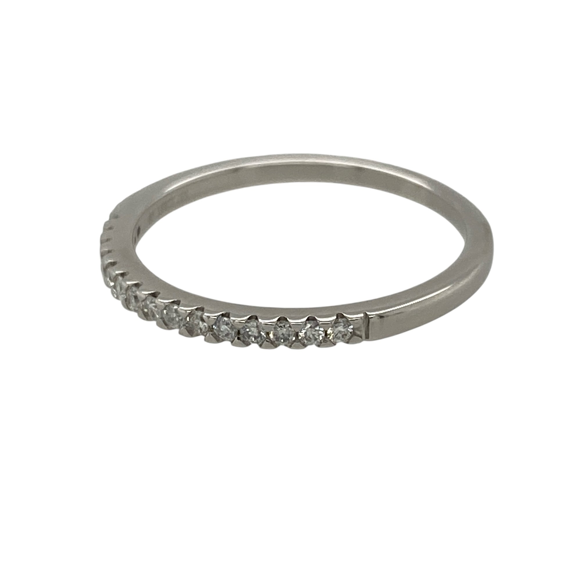 This pre-owned 18ct white gold diamond band ring is a delicate design, featuring approximately 0.15ct of diamond content set across the front.

Design: Featuring a slim diamond set band design, this ring has a simple profile finished in 18ct white gold.
Material: Made from 18-carat white gold.
Gemstone Detail: Approximately 0.15ct of diamond content set in total.
Ring Detail: Front of the band measures approximately 1.3mm wide.
Size & Weight: Ring size O to P. Total weight 1.90 grams.