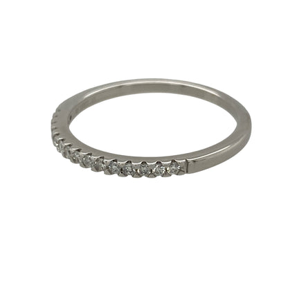 This pre-owned 18ct white gold diamond band ring is a delicate design, featuring approximately 0.15ct of diamond content set across the front.

Design: Featuring a slim diamond set band design, this ring has a simple profile finished in 18ct white gold.
Material: Made from 18-carat white gold.
Gemstone Detail: Approximately 0.15ct of diamond content set in total.
Ring Detail: Front of the band measures approximately 1.3mm wide.
Size & Weight: Ring size O to P. Total weight 1.90 grams.