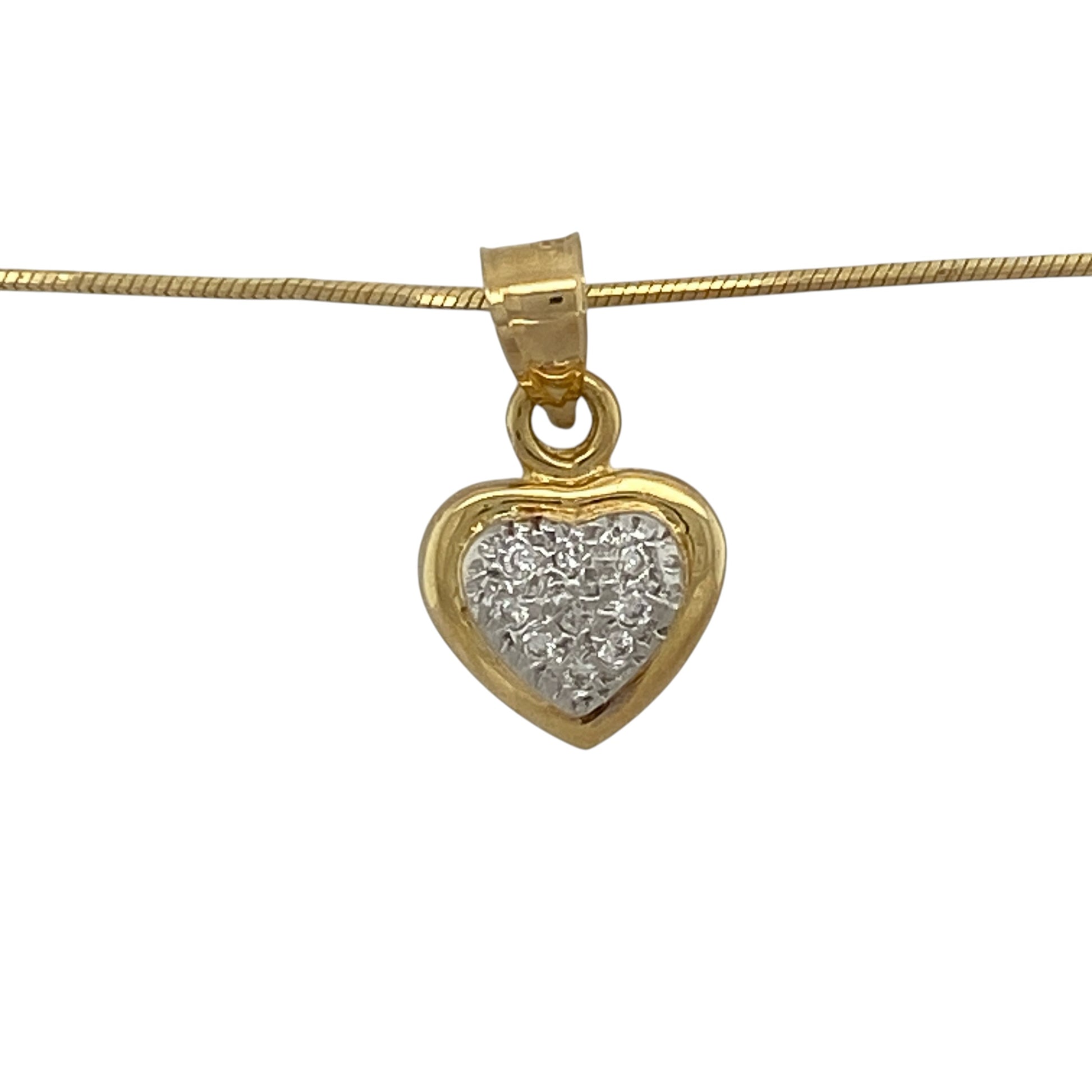 This pre-owned 18ct yellow gold diamond heart pendant necklace is a classic design, featuring a diamond set heart suspended from a flat snake chain.

Design: Featuring a heart-shaped pendant with diamond detailing, this necklace combines a timeless design with the warm finish of 18ct yellow gold.
Material: Made from 18-carat yellow gold.
Gemstone Detail: Heart pendant set with diamonds.
Pendant Detail: Pendant measures approximately 1.9cm long including the bail.
