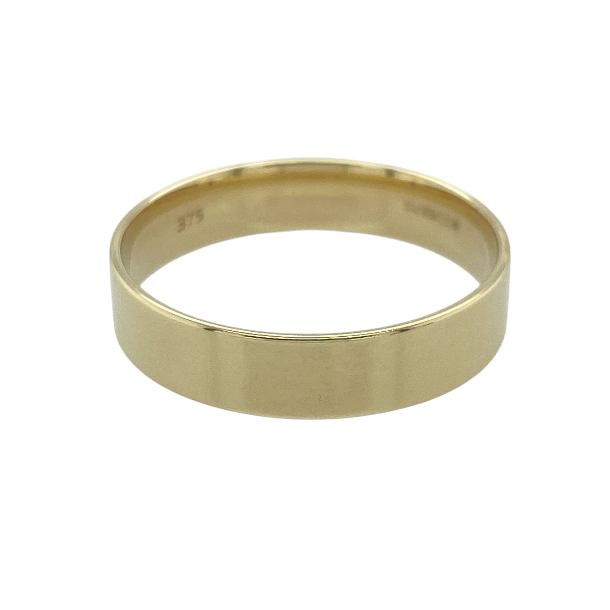 This pre-owned 9ct yellow gold flat wedding band ring is a timeless design, featuring a simple 5mm wide profile.

Design: Featuring a classic flat wedding band design, this ring has a clean, simple profile finished in warm 9ct yellow gold.
Material: Made from 9-carat yellow gold.
Ring Detail: Band measures approximately 5mm wide.
Size & Weight: Ring size V. Total weight 3.30 grams.

A classic pre-owned 9ct yellow gold wedding band ring, perfect as a traditional wedding ring or for everyday wear.