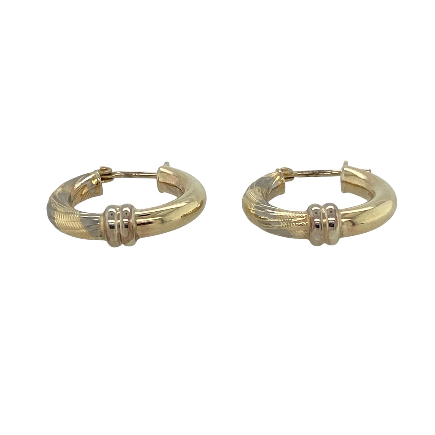 These pre-owned 9ct yellow and white gold twisted hoop creole earrings are a distinctive two-tone design, combining contrasting gold tones with a twisted finish.

Design: Featuring a twisted hoop design in alternating yellow and white gold, these creole earrings have a decorative two-tone finish.
Material: Made from 9-carat yellow and white gold.
Earring Detail: Twisted hoop creole design measuring approximately 17mm in diameter.
Size & Weight: Total weight 2.40 grams.