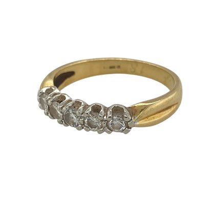 This pre-owned 18ct yellow gold diamond five stone band ring is a classic design, featuring approximately 0.55ct of diamond content set across the front.

Design: Featuring five diamonds set across the front of the band, this ring combines a traditional five-stone design with the warm finish of 18ct yellow gold.
Material: Made from 18-carat yellow gold.
Gemstone Detail: Five diamonds with approximately 0.55ct of diamond content in total and approximate SI clarity.