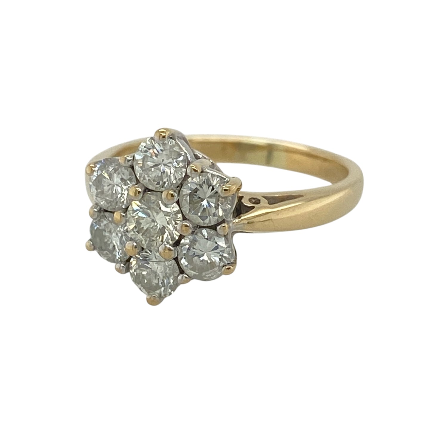 This pre-owned 18ct yellow gold diamond flower cluster ring is a statement design, featuring approximately 1ct of diamond content arranged in a floral-style cluster.

Design: Featuring a flower-shaped diamond cluster, this ring brings multiple diamonds together in a classic floral design finished in warm 18ct yellow gold.
Material: Made from 18-carat yellow gold.
Gemstone Detail: Approximately 1ct of diamond content set in total.
Ring Detail: Diamond flower cluster design.