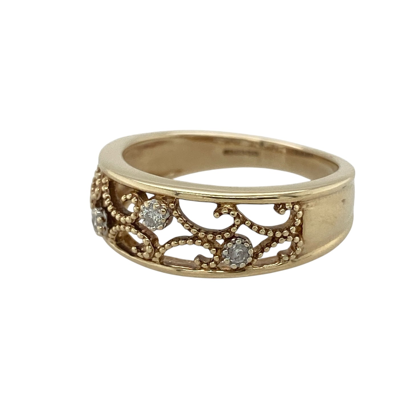 This pre-owned 9ct yellow gold diamond open swirl style band ring is a decorative design, featuring flowing open detailing with diamond accents.

Design: Featuring an open swirl-style design with diamond detailing, this ring has a flowing patterned front finished in warm 9ct yellow gold.
Material: Made from 9-carat yellow gold.
Gemstone Detail: Set with diamonds.
Ring Detail: Front of the band measures approximately 7mm wide.
Size & Weight: Ring size N. Total weight 3.80 grams.