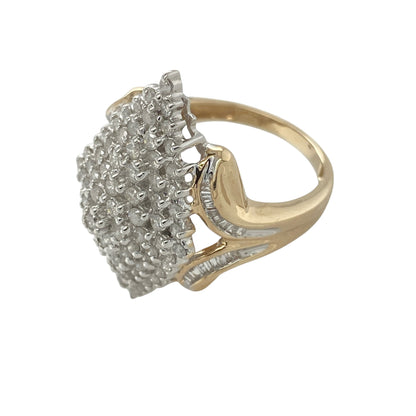This pre-owned 9ct yellow gold diamond marquise cluster ring is a statement design, featuring an elongated marquise-shaped cluster with approximately 0.89ct of diamond content.

Design: Featuring a large marquise-shaped diamond cluster, this ring has an elongated statement design finished in warm 9ct yellow gold.
Material: Made from 9-carat yellow gold.
Gemstone Detail: Approximately 0.89ct of diamond content set in total.
Ring Detail: Front of the ring measures approximately 2.9cm high.
