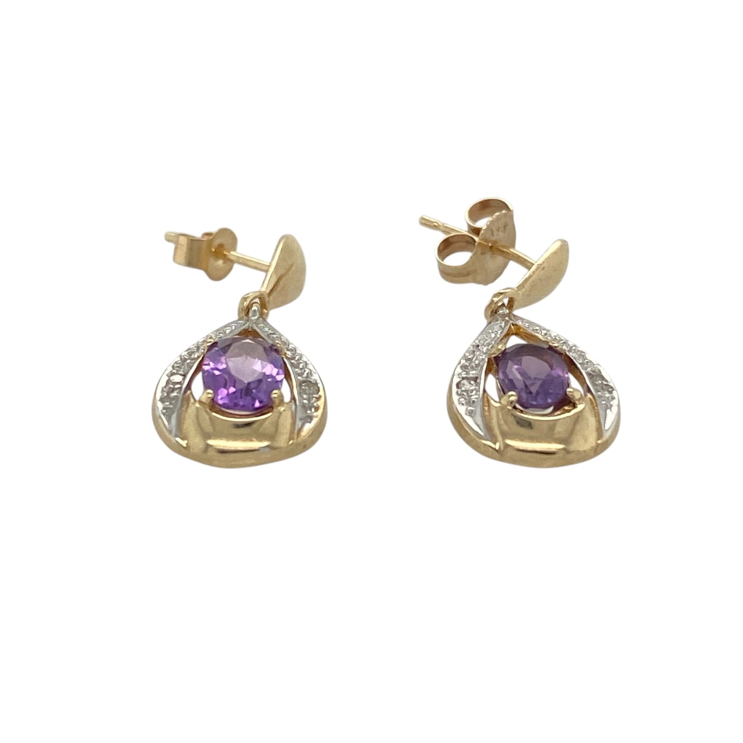 These pre-owned 9ct yellow gold diamond and amethyst drop earrings are a classic gemstone design, featuring oval amethyst stones with diamond detailing.

Design: Featuring oval amethyst stones with diamond detailing, these drop earrings combine rich purple tones with the warm finish of 9ct yellow gold.
Material: Made from 9-carat yellow gold.
Gemstone Detail: Oval amethyst stones each measuring approximately 6mm by 4mm with diamond detailing.
Earring Detail: Diamond and amethyst drop earring design.