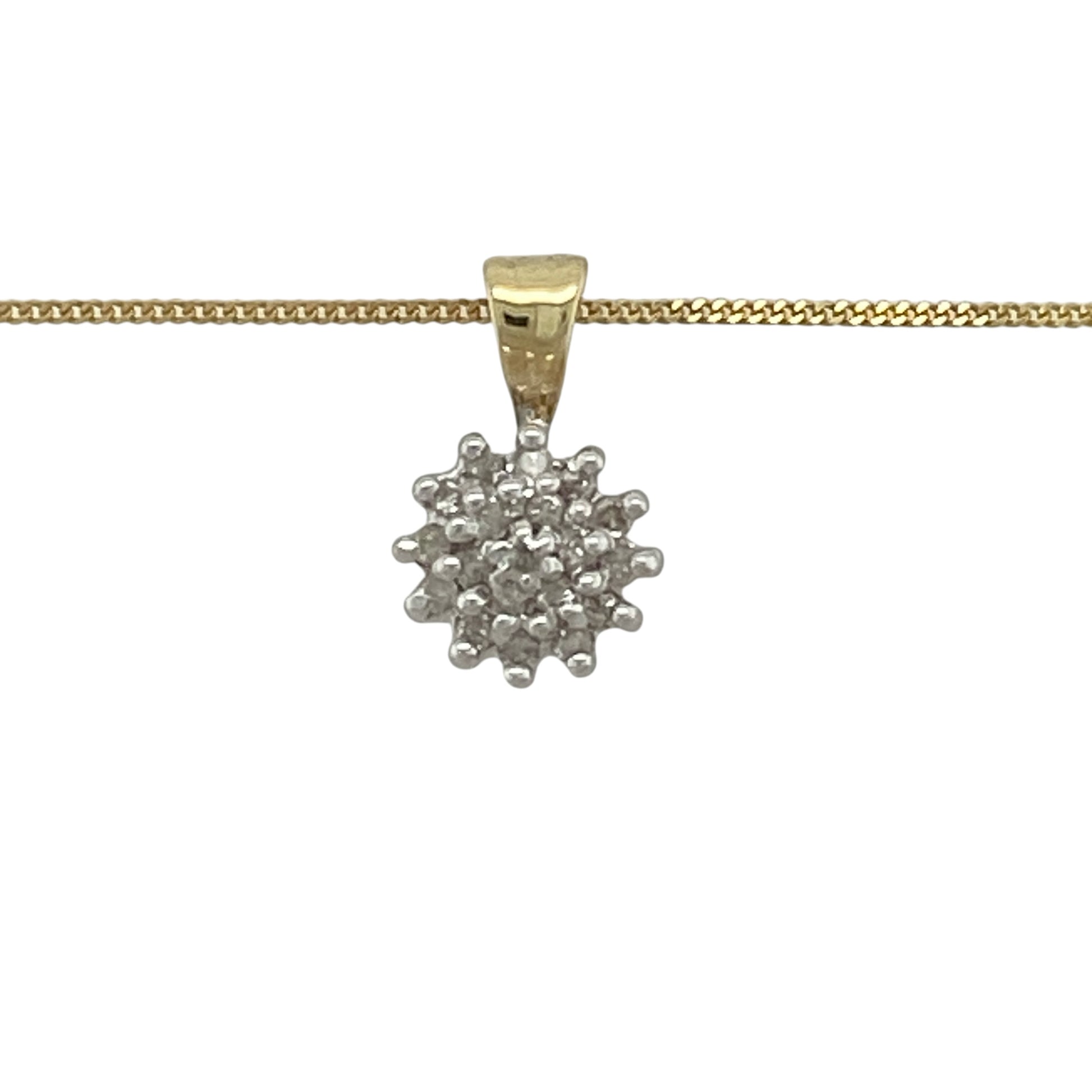 This pre-owned 9ct yellow gold diamond cluster pendant necklace is a classic design, featuring a diamond cluster suspended from a curb chain.

Design: Featuring a diamond cluster pendant suspended from an 18-inch curb chain, this necklace combines a classic diamond design with the warm finish of 9ct yellow gold.
Material: Made from 9-carat yellow gold.
Gemstone Detail: Cluster pendant set with diamonds.
Pendant Detail: Pendant measures approximately 1.3cm long including the bail.