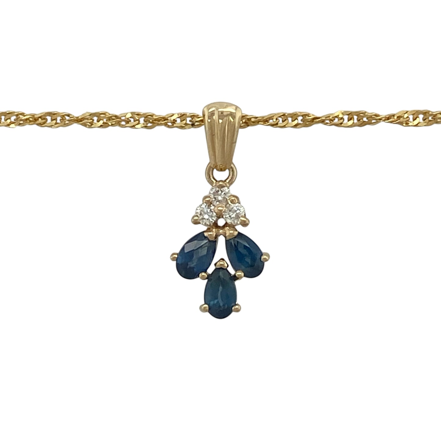 This pre-owned 9ct yellow gold diamond and sapphire pendant necklace is a decorative gemstone design, featuring three teardrop sapphires with diamond detailing.

Design: Featuring three teardrop-shaped sapphires with three diamonds set above, this pendant is suspended from an 18-inch Singapore chain and finished in warm 9ct yellow gold.
Material: Made from 9-carat yellow gold.
Gemstone Detail: Three teardrop sapphire stones with three diamonds set above.