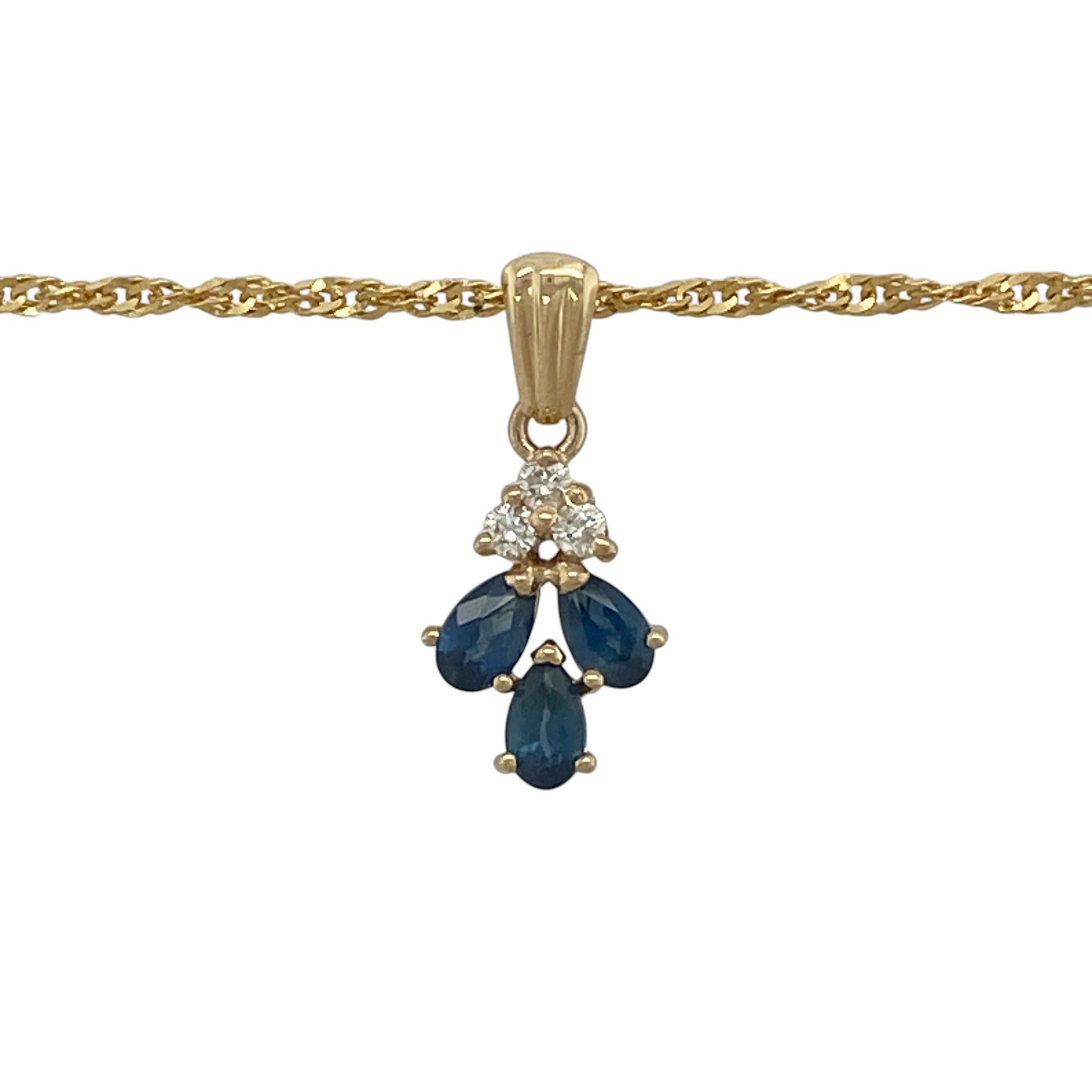 This pre-owned 9ct yellow gold diamond and sapphire pendant necklace is a decorative gemstone design, featuring three teardrop sapphires with diamond detailing.

Design: Featuring three teardrop-shaped sapphires with three diamonds set above, this pendant is suspended from an 18-inch Singapore chain and finished in warm 9ct yellow gold.
Material: Made from 9-carat yellow gold.
Gemstone Detail: Three teardrop sapphire stones with three diamonds set above.