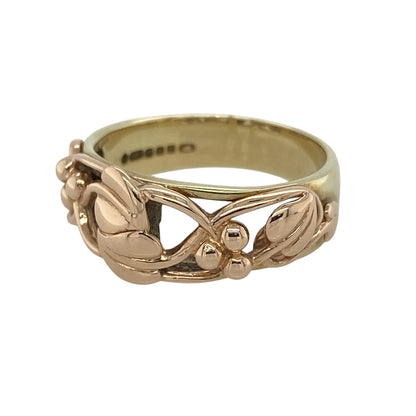 Bring symbolic beauty and heritage style to your collection with this pre-owned 9ct yellow and rose gold Tree of Life ring by Clogau, a meaningful design blending natural inspiration with timeless elegance.

Design: The front of the band measures 8mm wide and features the iconic Tree of Life motif, symbolising growth, strength, and harmony.
Material: Made from 9-carat yellow and rose gold, the two-tone finish enhances the intricate detailing and adds depth to the design.