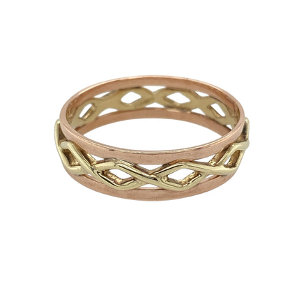Add symbolic beauty and unique Welsh heritage to your collection with this pre-owned 9ct yellow and rose gold Clogau open weave band ring—a distinctive piece that blends tradition with elegant style, perfect for everyday wear or marking special occasions.

Design: This ring features an intricate open weave pattern across the 6mm wide front, beautifully combining yellow and rose gold for a warm, layered look.