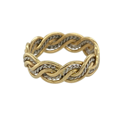 Celebrate Welsh heritage and timeless craftsmanship with this pre-owned 9ct yellow and white Welsh gold twisted band ring, featuring an elegant two-tone design with distinctive flowing detail.

Design: The ring showcases a stylish twisted band design that combines contrasting yellow and white gold tones, creating depth, movement and visual interest. Measuring approximately 6mm wide, the substantial profile gives the ring an eye-catching presence while maintaining a refined and timeless appearance.