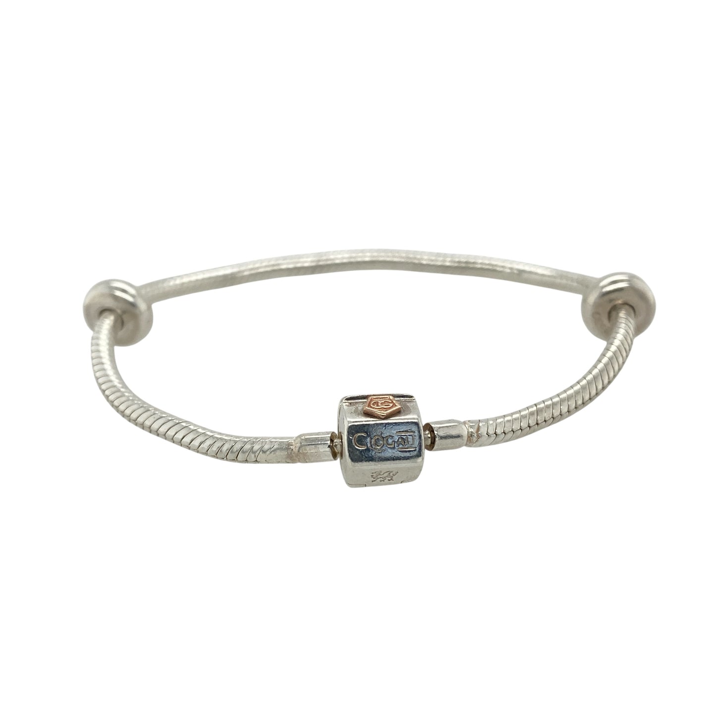This pre-owned Clogau charm bracelet is a beautiful sterling silver and 9ct rose gold design, complete with two stoppers ready for adding your favourite charms.

Design: Featuring a classic Clogau charm bracelet design, this piece combines polished sterling silver with signature 9ct rose gold detailing for a timeless two-tone finish. Complete with two stoppers to help keep charms securely positioned, the bracelet can be personalised with a selection of meaningful charms to create a unique piece of jewellery