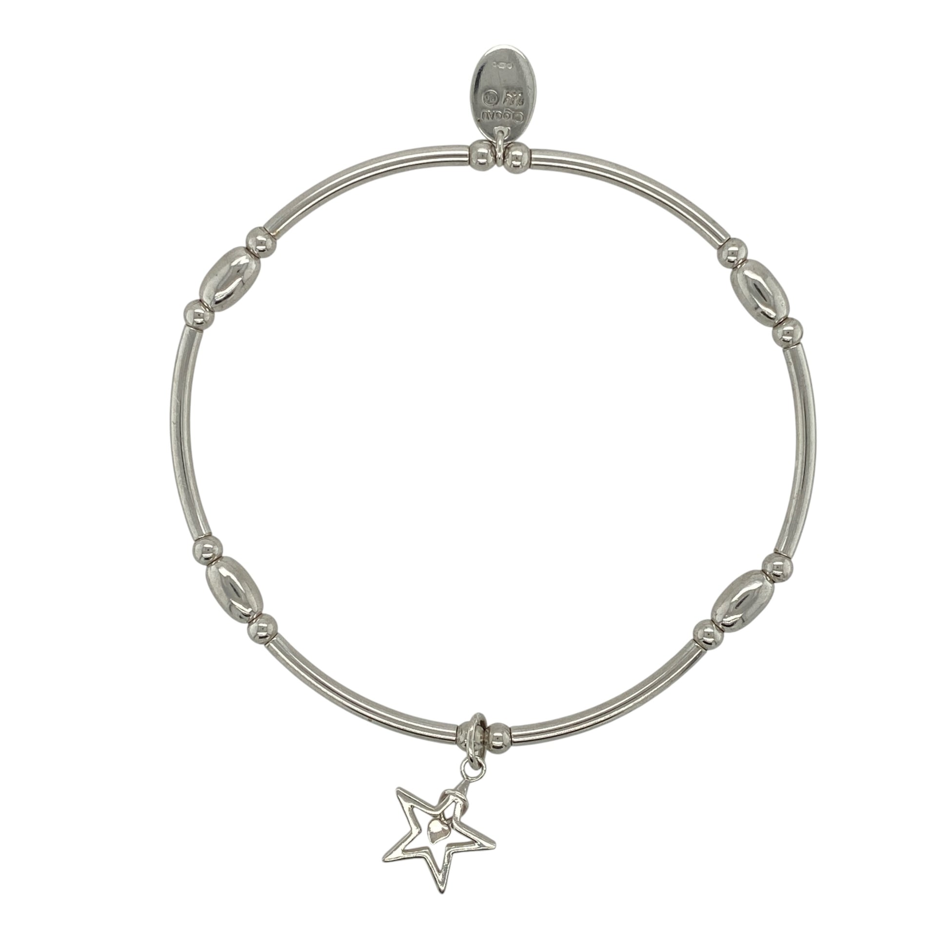 This pre-owned Clogau Tree of Life star stretchy bracelet is a distinctive two-tone design, combining 925 silver with signature 9ct rose gold detailing.

Design: Featuring a star-shaped centrepiece with Clogau’s iconic Tree of Life detailing, this stretchy bracelet combines polished silver with contrasting rose gold accents.
Material: Made from 925 sterling silver with 9-carat rose gold detailing.
Bracelet Detail: Stretchy bracelet design featuring a Tree of Life star centrepiece.