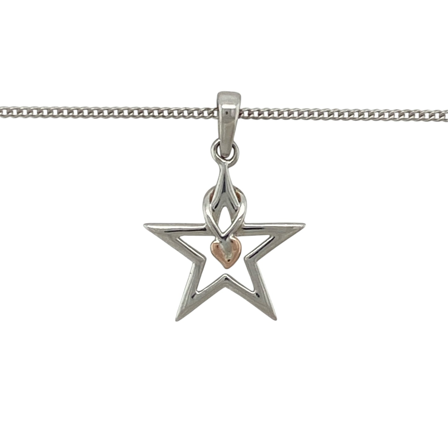 This pre-owned Clogau ‘Starlight’ pendant necklace is a distinctive two-tone design, featuring a star shape with signature Tree of Life detailing.

Design: Featuring a star-shaped ‘Starlight’ pendant with Clogau’s iconic Tree of Life detailing, this necklace combines polished silver with contrasting 9ct rose gold accents.
Material: Made from 925 sterling silver with 9-carat rose gold detailing.
Pendant Detail: Star-shaped pendant measures approximately 2.1cm long including the bail.