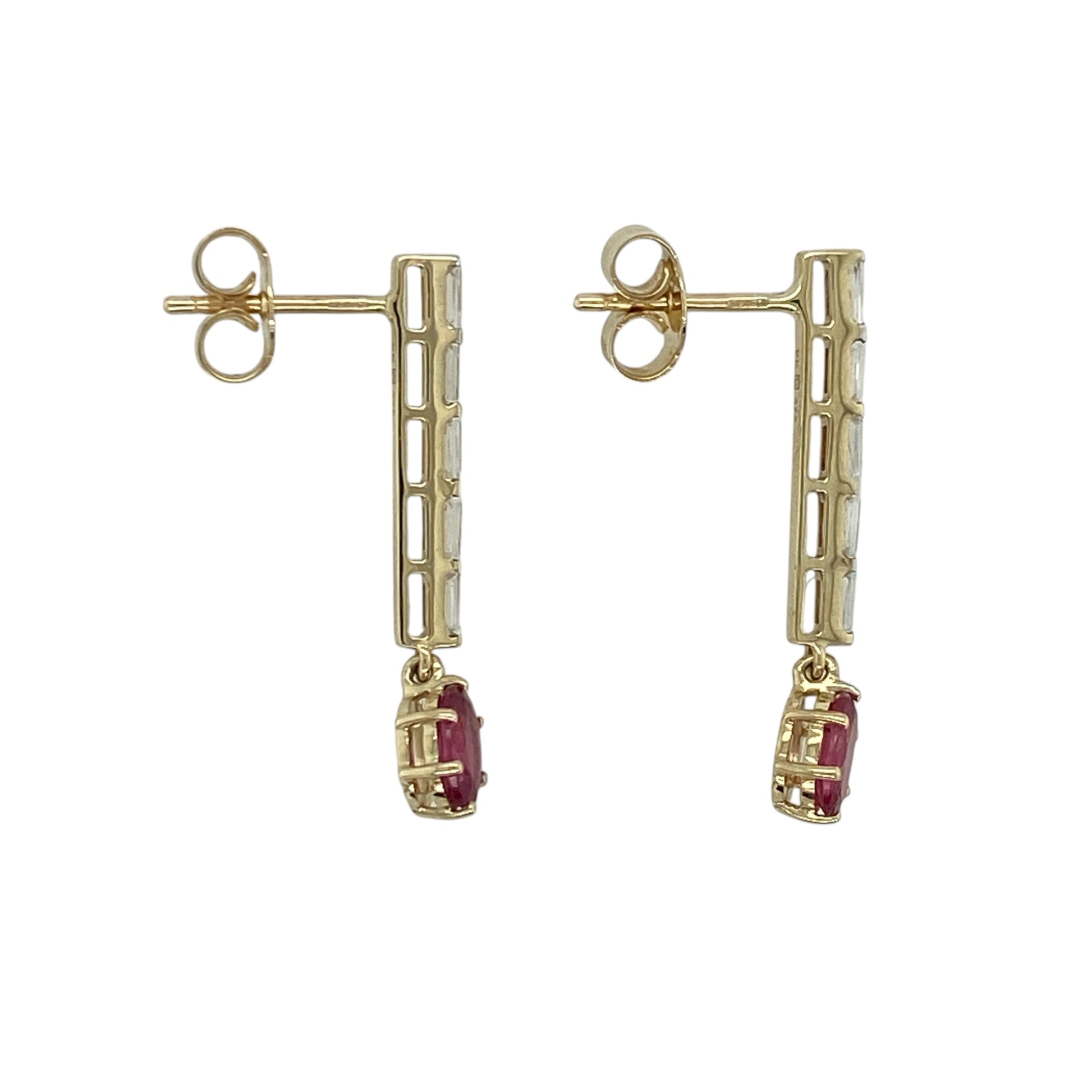 These pre-owned 9ct yellow gold pink ruby and cubic zirconia drop earrings are a colourful gemstone design, featuring oval pink ruby stones with cubic zirconia detailing.

Design: Featuring oval pink ruby stones with cubic zirconia detailing, these drop earrings combine soft pink tones with the warm finish of 9ct yellow gold.
Material: Made from 9-carat yellow gold.
Gemstone Detail: Oval pink ruby stones each measuring approximately 6mm by 4mm with cubic zirconia detailing.