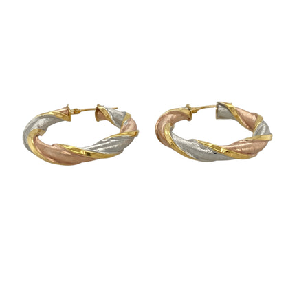 These pre-owned 9ct yellow, rose and white gold twisted hoop creole earrings are a distinctive three-tone design, featuring intertwined gold tones throughout.

Design: Featuring a twisted hoop creole design combining yellow, rose and white gold, these earrings have a decorative three-tone finish.
Material: Made from 9-carat yellow, rose and white gold.
Earring Detail: Twisted three-tone hoop creole earring design.
Size & Weight: Total weight 2.80 grams.