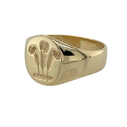 This pre-owned 9ct yellow gold Welsh Three Feathers oval signet ring is a distinctive Welsh-inspired design, featuring the traditional Three Feathers emblem.

Design: Featuring the Welsh Three Feathers emblem on an oval signet face, this ring has a traditional design finished in warm 9ct yellow gold.
Material: Made from 9-carat yellow gold.
Ring Detail: Oval signet face featuring the Welsh Three Feathers design and measuring approximately 11mm high.
Size & Weight: Ring size M. Total weight 3.80 grams.