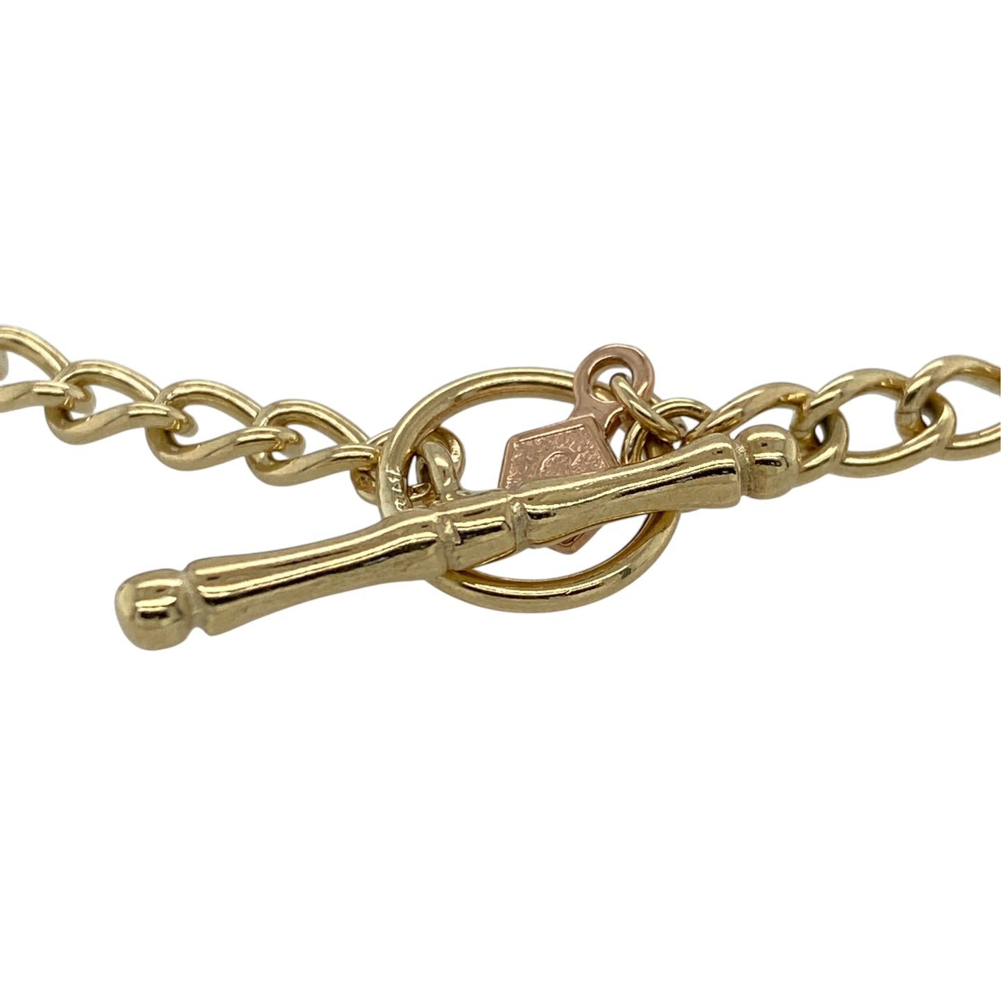 This pre-owned 9ct yellow and rose gold Clogau charm T-bar bracelet is a substantial two-tone design, featuring four distinctive Clogau charms.

Design: Featuring a classic T-bar fastening with four decorative Clogau charms, this bracelet combines warm yellow gold with contrasting rose gold detailing.
Material: Made from 9-carat yellow and rose gold.
Bracelet Detail: Features four Clogau charms including a daffodil, daisy, teardrop Tree of Life and round Tree of Life design.